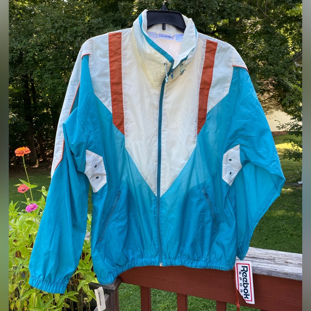Vintage 80’s 90’s NWT Foot Locker Reebok men’s blue & cream windbreaker.